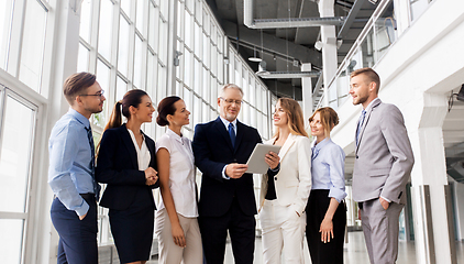 Image showing business people with tablet pc computer at office