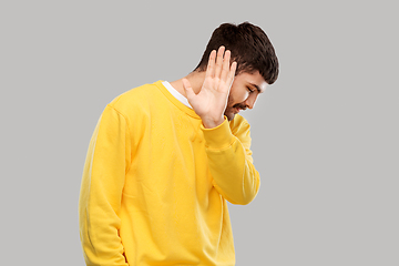 Image showing serious young man showing refusal gesture