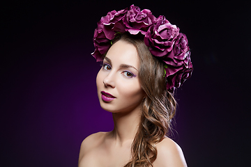 Image showing beautiful girl with purple makeup and flowers