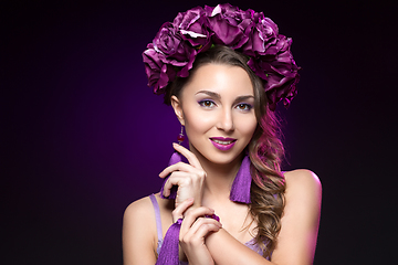 Image showing beautiful girl with purple makeup and flowers