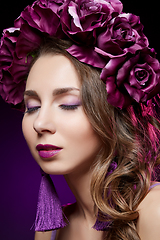 Image showing beautiful girl with purple makeup and flowers