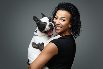 Image showing young woman with french bulldog dog