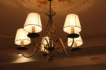 Image showing chandelier with romantic standard lamps