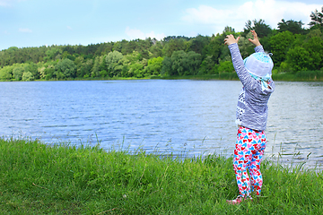 Image showing baby indicates something near the river in the forest