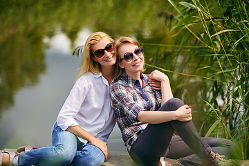 Image showing three girls having fun outdoors