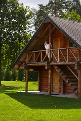 Image showing young woman resting in countyside house