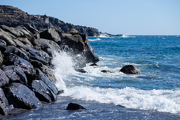 Image showing beautiful wild beach with black sand