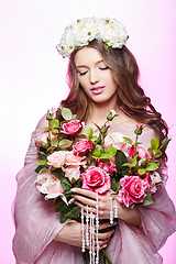 Image showing beautiful girl with pink makeup and flowers