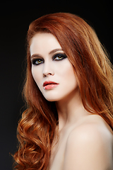 Image showing girl with beautiful long red hair