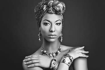 Image showing beautiful mulatto young woman with turban on head