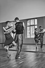 Image showing beautiful couple dancing tango