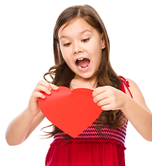 Image showing Portrait of a sad little girl in red