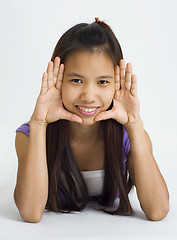 Image showing young asian woman framed face