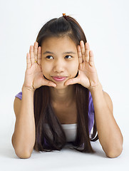 Image showing young asian woman framed face