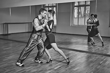 Image showing beautiful couple dancing tango