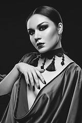 Image showing beautiful young woman with dark makeup