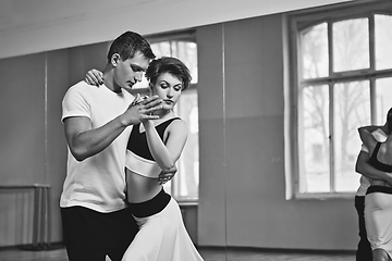 Image showing beautiful couple dancing tango