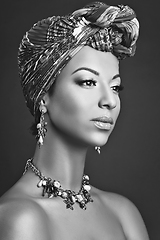 Image showing beautiful mulatto young woman with turban on head