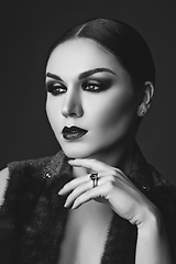 Image showing beautiful young woman with dark makeup