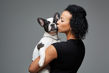 Image showing young woman with french bulldog dog