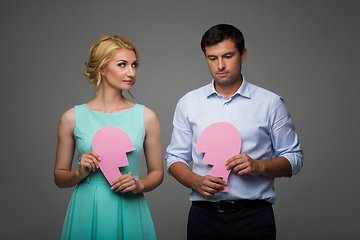 Image showing Beautiful couple holding pink broken heart