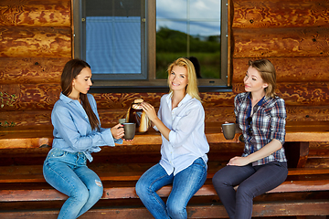 Image showing young women drinking tea