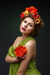 Image showing girl in long dress with flowers on head