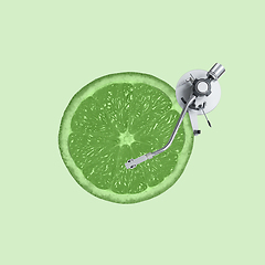 Image showing Contemporary art collage, modern design. Summer mood. Media player made of lime green and juicy slice on green