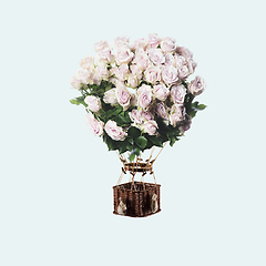 Image showing Contemporary art collage, modern design. Summer mood. Balloon with bouquet of tender white roses on light blue