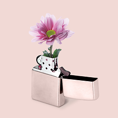Image showing Contemporary art collage, modern design. Summer mood. White lighter with blooming flower inside it on tender pink