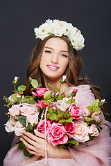 Image showing beautiful girl with pink makeup and flowers