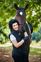 Image showing beautiful girl with horse