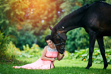 Image showing beautiful girl in dress with horse