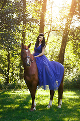 Image showing beautiful girl in dress with horse