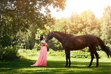 Image showing beautiful girl in dress with horse