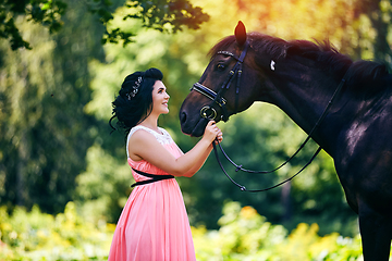 Image showing beautiful girl in dress with horse