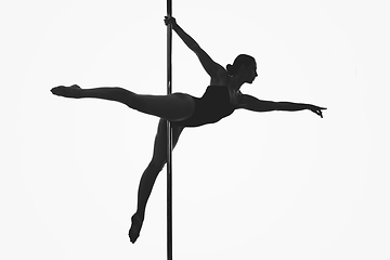 Image showing beautiful pole dancer girl silhouette