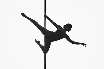 Image showing beautiful pole dancer girl silhouette