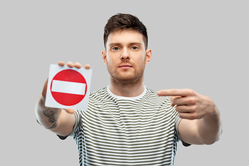 Image showing young man showing stop sign