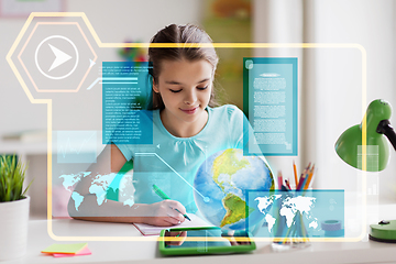 Image showing girl with tablet pc learning geography at home