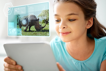 Image showing girl with tablet pc learning nature online at home