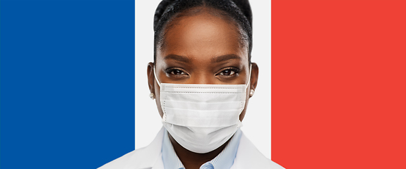 Image showing african american doctor in medical mask in france