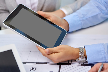 Image showing architects with tablet pc and blueprint at office