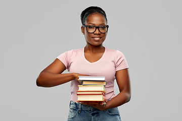 Image showing happy african american woman with books