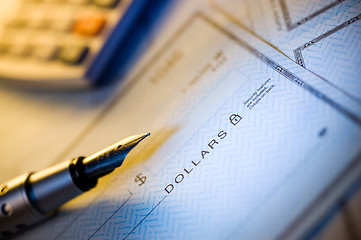 Image showing money check and pen