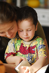 Image showing Child with a mammy