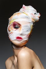 Image showing girl with heavy makeup and bandage on head