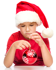 Image showing Young unhappy girl in christmas cloth