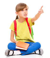 Image showing Little girl with her books