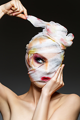 Image showing girl with heavy makeup and bandage on head